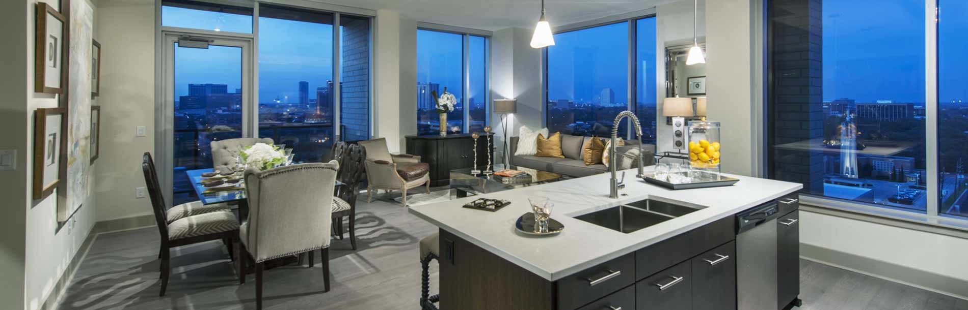 Living room with skyline view from extended stay apartment