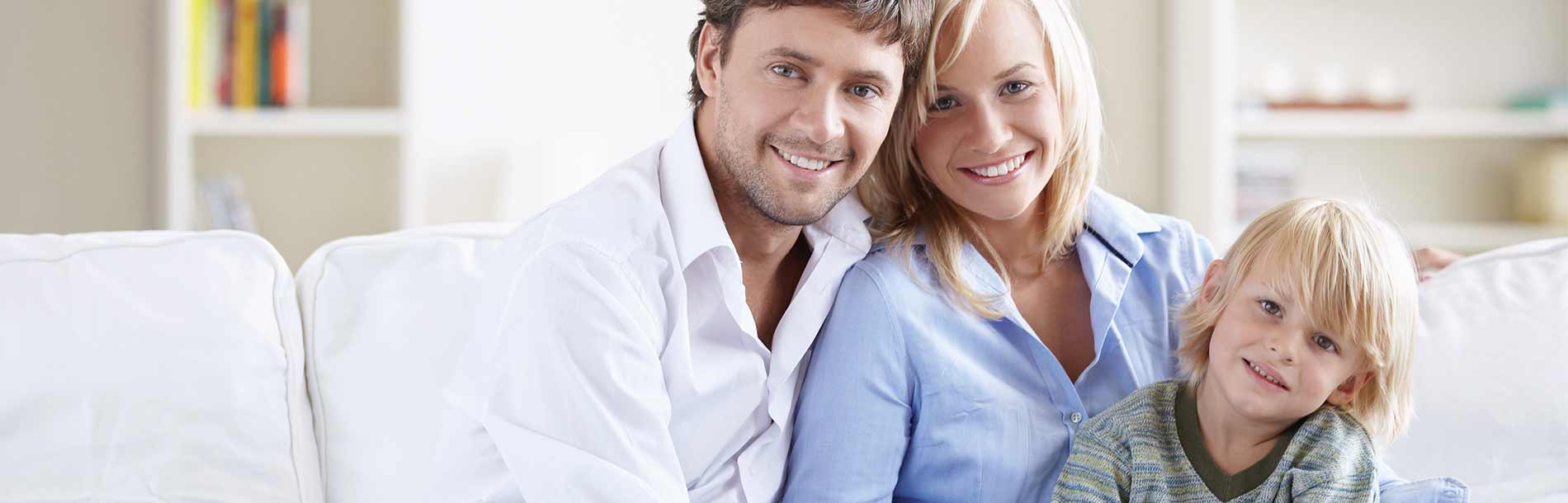 Man, woman and child in corporate apartment.